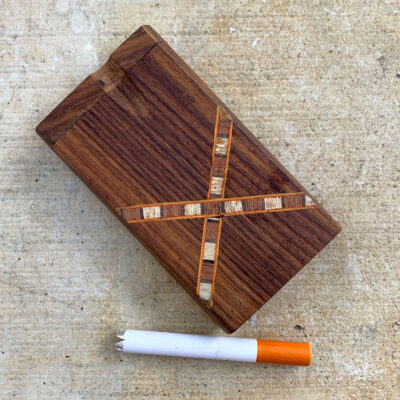 One Hitter Dugout Box sitting next to claw tipped pipe | Best One Hitters Product Image